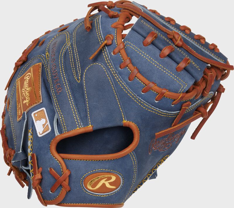 Back of a Heart of the Hide Pro Label Denim catcher's mitt with a tan leather Oval-R on the wrist loading=