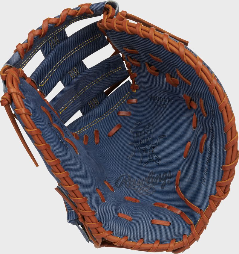 Palm of a Rawlings Heart of the Hide Pro Label Denim 1st base mitt with tan laces loading=