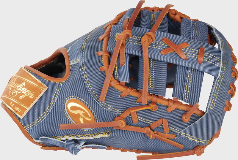 Thumb of a Heart of the Hide Pro Label Denim 1st base mitt with a single post, double bar web loading=